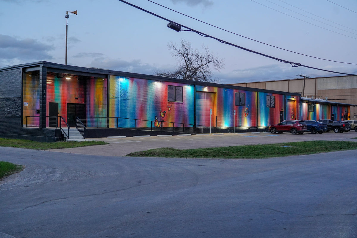 Gallery DeFi building at 2200 Evanston Avenue in West Dallas at dusk